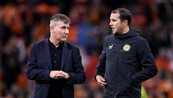 Former Republic of Ireland manager Stephen Kenny and newly-appointed interim head coach John O'Shea, right, before the UEFA EURO 2024 Championship qualifying group B match against the Netherlands at Johan Cruijff ArenA in Amsterdam. Picture: Stephen McCarthy/Sportsfile