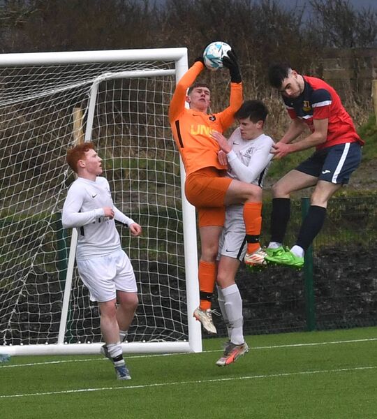  St. Gerald’s goalkeeper Oisin Costello makes a magnificent save as St. Muredach college’s Adam Parsons challenges for the ball during the FAI Schools’ Connacht Senior Cup final at Enniscrone FC last Thursday. Picture: David Farrell Photography 