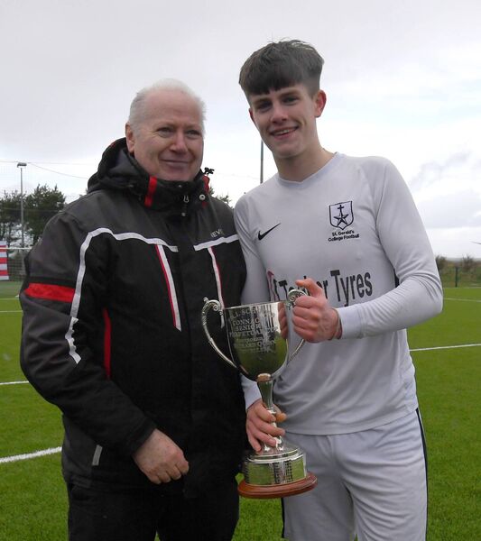 Gerry Conway, Connacht FA, presents the Connacht Schools’ Senior Cup to St. Gerald’s College team captain Shane Cunningham at Enniscrone FC last Thursday. Picture: David Farrell Photography Gerry Conway, Connacht FA, presents the Connacht Schools’ Senior Cup to St. Gerald’s College team captain Shane Cunningham at Enniscrone FC last Thursday. Picture: David Farrell Photography