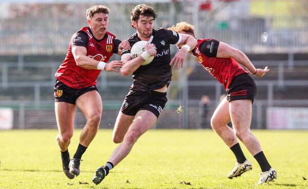 Sligo's Luke Towey is challenged by Pierce Laverty and Danny Magill of Down. Picture: INPHO/Tom Maher Sligo's Luke Towey is challenged by Pierce Laverty and Danny Magill of Down. Picture: INPHO/Tom Maher