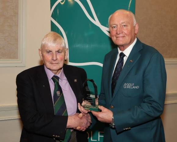 Connacht Club Volunteer of the Year Patsy Noone receives his award from Jimmy Duggan.
