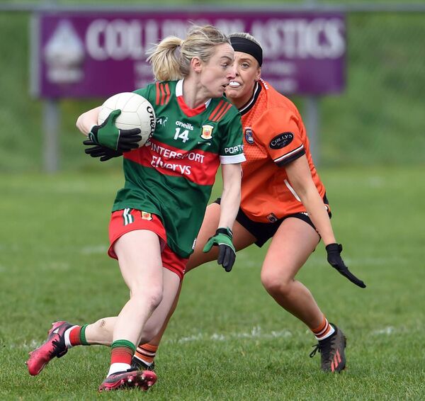 Mayo’s Lisa Cafferky side steps Armagh’s Niamh Coleman. Picture: David Farrell Photography 