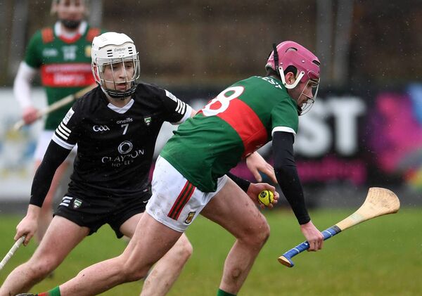 Mayo’s Daniel Huane breaks away from Sligo’s Fionn Connolly. Mayo’s Daniel Huane breaks away from Sligo’s Fionn Connolly.