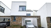 Modern design home is presented in excellent condition throughout