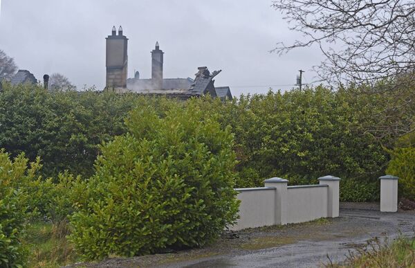Emergency services were alerted to the fire in a house at Deerpark, on the outskirts of Swinford, at around 2am. Picture: Conor McKeown Emergency services were alerted to the fire in a house at Deerpark, on the outskirts of Swinford, at around 2am. Picture: Conor McKeown