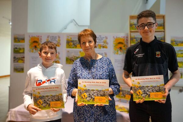 Co-author Katherine Mangan, pictured at the launch with her grandsons Finn and Ryan Conmy
