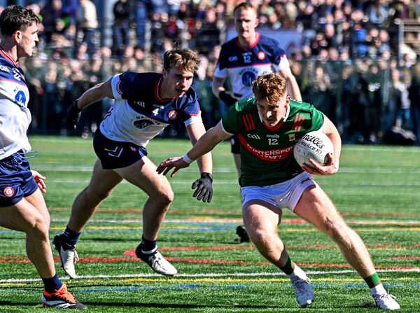 Mayo's Jack Carney gets by Tadgh O'Riordan of New York during last Sunday's Connacht SFC Quarter-Final in The Bronx. New York GAA stated afterwards that it was the largest crowd to ever watch a game at Gaelic Park - although no official attendance was given.	Pictures: INPHO/Emily Harney