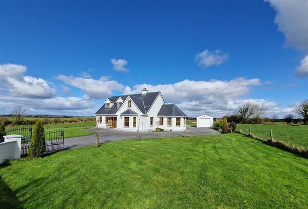 The home has a large garden and ample space surrounding it.
