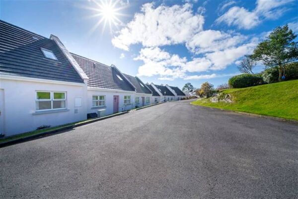 The property comprises a three bedroom mid- terraced dormer bungalow style residence positioned within a secure gated development. The property comprises a three bedroom mid- terraced dormer bungalow style residence positioned within a secure gated development.