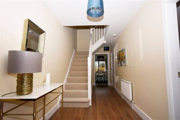 The hallway and staircase at the elegant home The hallway and staircase at the elegant home