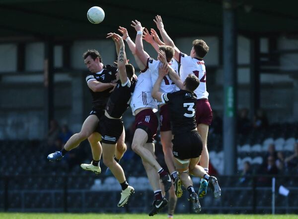 Sligo and Galway players compete for a high ball in Markievicz Park last Saturday afternoon.