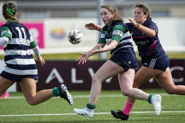Emma Tolan offloads the ball for Ballina.