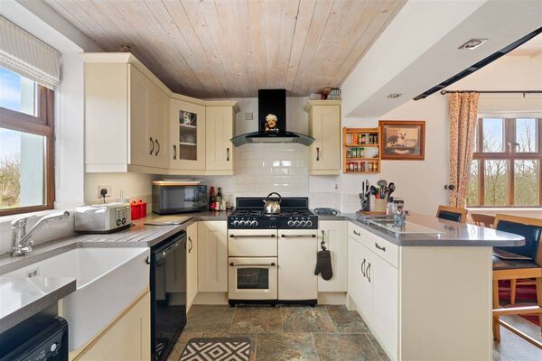 The kitchen area at the bright and modern property