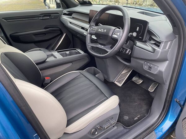 The lounge-like interior is stylish and quite minimalistic featuring vegan leather upholstery.