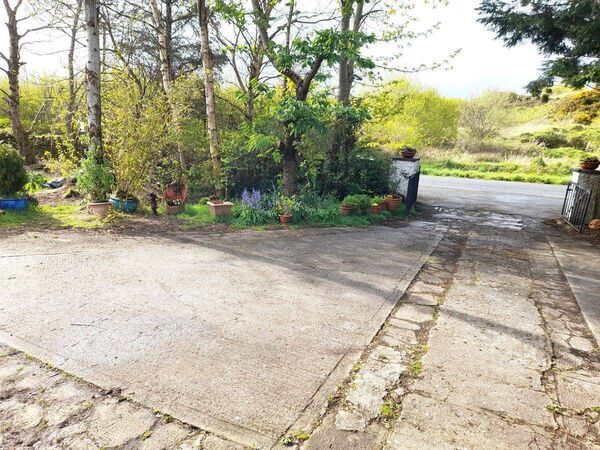 The driveway into the home which was built in the 1880s and renovated The driveway into the home which was built in the 1880s and renovated