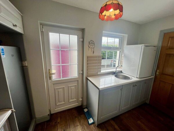 The kitchen area of the detached house