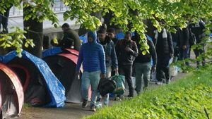 Harris hails ‘Team Ireland’ operation as 163 migrants are removed from camp