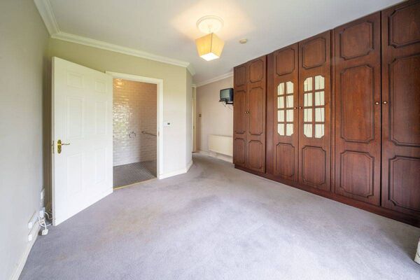 A large bedroom with an ensuite A large bedroom with an ensuite