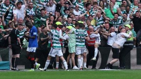 Celtic go six points clear with 2-1 win over 10-man Rangers