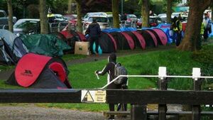 Government to review payments to migrants amid influx