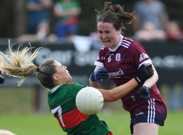 Mayo’s Danielle Caldwell is flattened when trying to block the solo run of Galway’s Nicola Ward during last Sunday's TG4 Connacht LGFA SFC final at Kiltoom.	Pictures: David Farrell Photography 