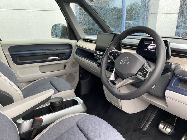 The interior is extremely spacious, with huge head and legroom for all occupants.