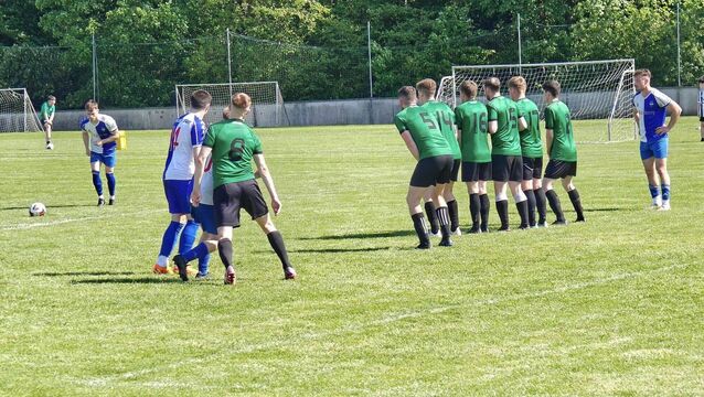 <p>Action from last Sunday's north Mayo derby between Ballina Town and Conn Rangers.</p>