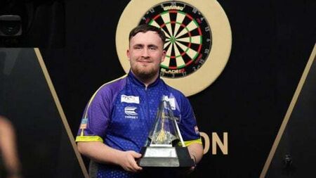 Luke Littler hits nine-darter as he storms to Premier League glory