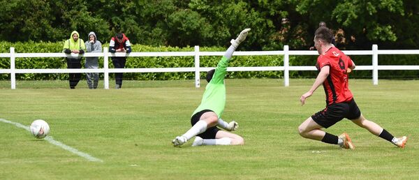 Westport United’s Kevin Ketterick slides the ball past Moyne Villa goalkeeper Luke Jennings for the equaliser. Picture: David Farrell Photography 