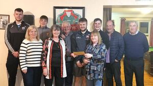 Local Notes: The Anglers Rest, Glenamoy make presentation to Cill Chomain GAA Club. Local Notes: The Anglers Rest, Glenamoy make presentation to Cill Chomain GAA Club.