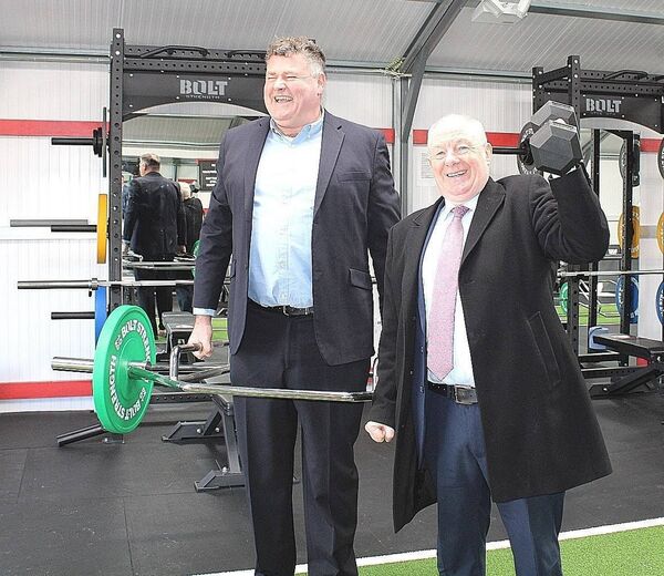 Political heavyweights Cllr Neil Cruise and Michael Ring TD test out the equipment at the opening of Moy Davitts GAA Club's new gym.  Political heavyweights Cllr Neil Cruise and Michael Ring TD test out the equipment at the opening of Moy Davitts GAA Club's new gym.