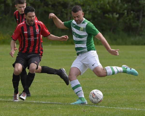 Castlebar Celtic’s goalscorer Liam Flatley in action against Westport United’s Cillian McGlade. Castlebar Celtic’s goalscorer Liam Flatley in action against Westport United’s Cillian McGlade.