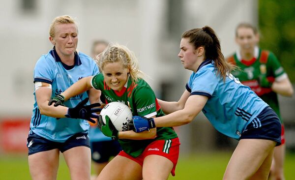 Mayo defender Éilís Ronayne comes under pressure from Dublin's Carla Rowe, left, and Kate Sullivan. Mayo defender Éilís Ronayne comes under pressure from Dublin's Carla Rowe, left, and Kate Sullivan.