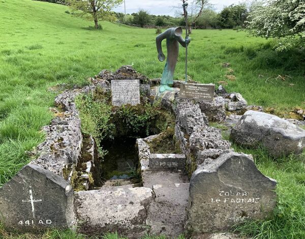The ancient St Patrick’s Well in Ballintubber Abbey grounds with a statue of St Patrick baptising the faithful that was sculptured and donated by the late Brother Joseph McNally, Ballintubber and Singapore. 	Picture: Tom Quinn