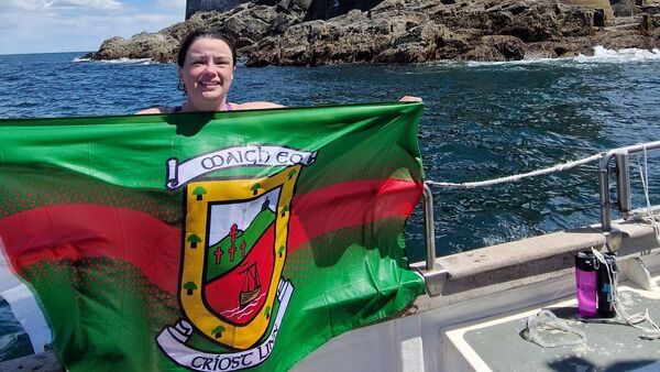 Carol conquers epic swim to iconic Irish landmark