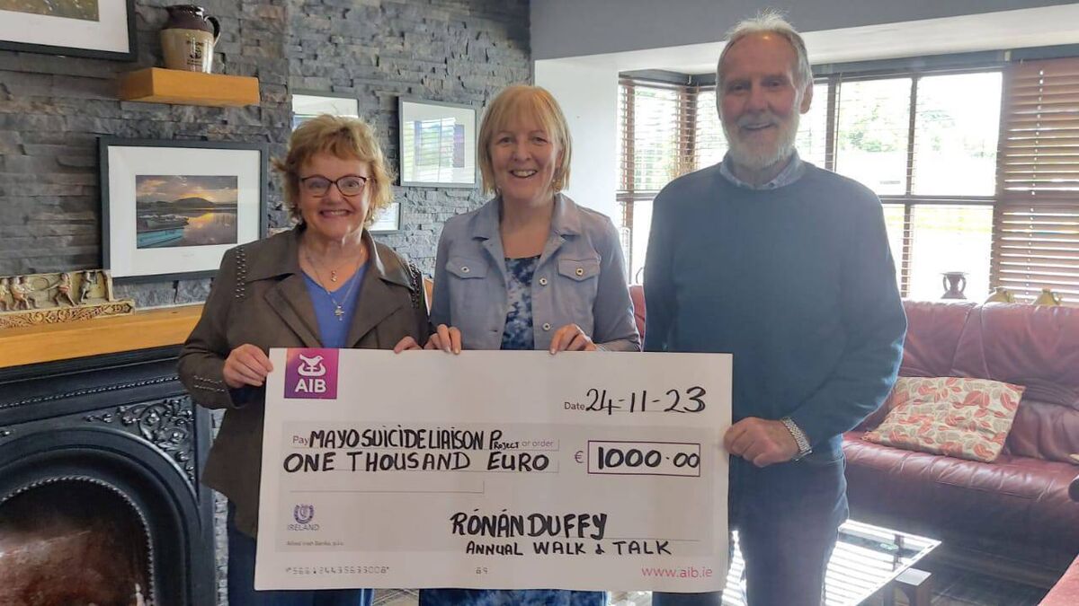 Local Notes: Una and Gerry Duffy, Doocastle, present €1000 to the Family Life Centre, Castlebar, following 'Walk and Talk' event in memory of their son Ronan.