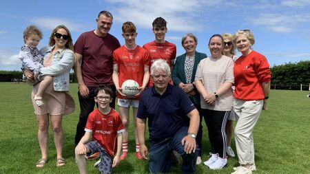 Local Notes: Owen Breslin with his family after scoring two goals for Ballintubber in their Division 1B clash with Garrymore.