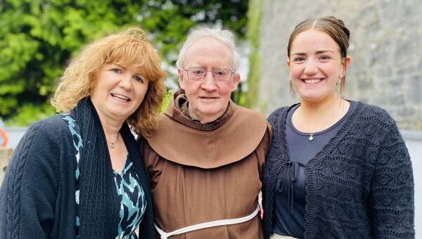 Errew Monastery cemetery prayer service which was held last Tuesday night - Brother Conal Thomas, Corrandulla, a native of Errew is pictured with his niece Fiona Fox and grandniece Áine Fox, Errew, who attended the commemorative service.