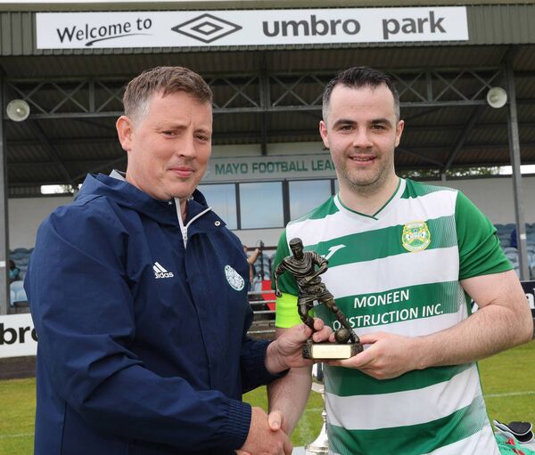 Chris MacHale-Roe, Mayo Football League, presents the Man of the Match award to Ciaran Gavin captain of Castlebar Celtic 'B' after defeating Westport United 'B' in the Tuohy Cup Final. Chris MacHale-Roe, Mayo Football League, presents the Man of the Match award to Ciaran Gavin captain of Castlebar Celtic 'B' after defeating Westport United 'B' in the Tuohy Cup Final.