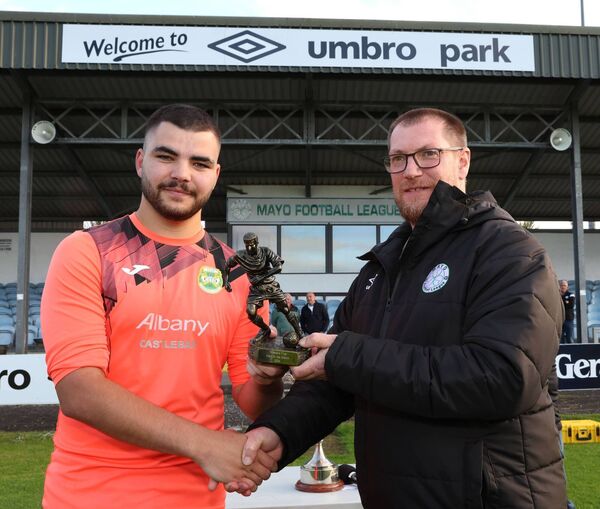 Castlebar Celtic's Stefan Hester is presented with the Man of the Match award by Seamus Hughes, Mayo Football League chairman Mayo League after defeating Ballina Town in the Westaro Cup Final in Umbro Park, Milebush. Castlebar Celtic's Stefan Hester is presented with the Man of the Match award by Seamus Hughes, Mayo Football League chairman Mayo League after defeating Ballina Town in the Westaro Cup Final in Umbro Park, Milebush.