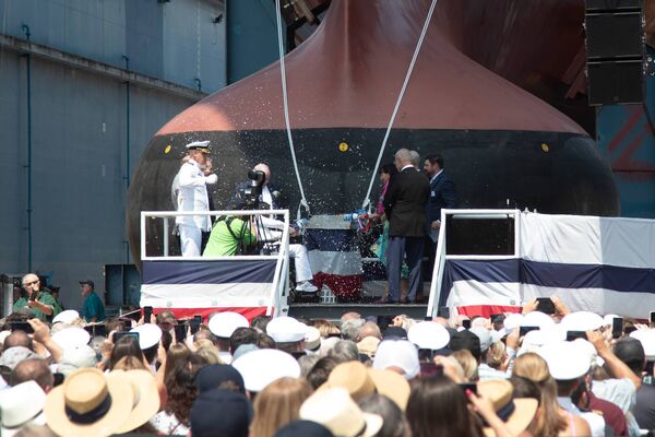 The sisters of Patrick Gallagher – Teresa Gallagher Keegan, Pauline Gallagher and Rosemarie Gallagher – are the sponsors of DDG 51. The three sisters – who traveled to Maine from Ireland this week, simultaneously broke bottles of sparkling wine over the ship’s bow, an ancient maritime tradition, while blessing the ship and all who sail in her.