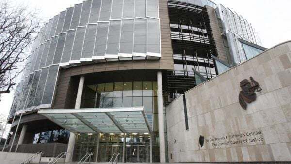 Masked raider with lighter poured flammable liquid in front of mother and baby, court told