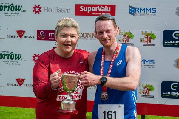 Gillian Morrow, of Trevor Morrow Ltd., Ballina, presents the Mary Morrow Memorial Cup to Aaron Donnelly, who was the first local male runner home in the recent Ballina Athletic Club Wild Atlantic Way 10-Miler Race. Picture: James Wright Photography Gillian Morrow, of Trevor Morrow Ltd., Ballina, presents the Mary Morrow Memorial Cup to Aaron Donnelly, who was the first local male runner home in the recent Ballina Athletic Club Wild Atlantic Way 10-Miler Race. Picture: James Wright Photography