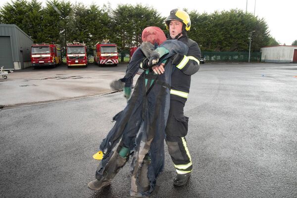 Firefighter Declan Maher from Castlebar will take part in the World Firefighters Games in Denmark in September. Pulling an 80kg dummy is one of the events in the games. Photo: Alison Laredo Firefighter Declan Maher from Castlebar will take part in the World Firefighters Games in Denmark in September. Pulling an 80kg dummy is one of the events in the games. Photo: Alison Laredo