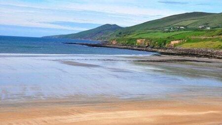 Man who died when saving children at Inch beach praised for 'heroism' at his funeral mass