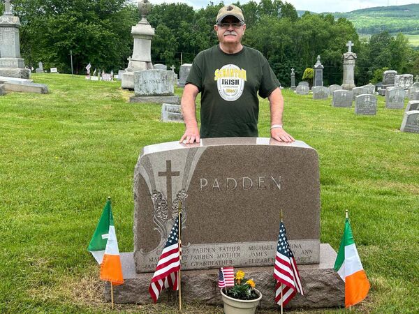 Jack Gaughan at the grave of Michael Davitt's father and sister in Scranton. Jack Gaughan at the grave of Michael Davitt's father and sister in Scranton.