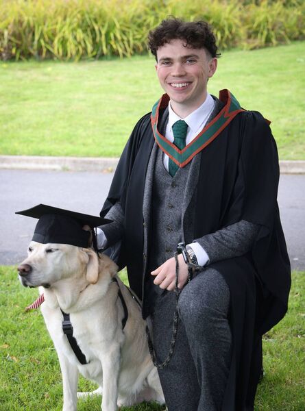 Ruairi Hennessey, from Ballina, with furry friend Pepe, after graduating with an Honours Bachelor of Science (Computer Science and Information Technology) from University of Galway. Picture: Aengus McMahon Ruairi Hennessey, from Ballina, with furry friend Pepe, after graduating with an Honours Bachelor of Science (Computer Science and Information Technology) from University of Galway. Picture: Aengus McMahon