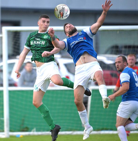 Calvin Joyce of Claremorris and Manulla's Andrew Shally in an aerial duel. Picture: John Corless Calvin Joyce of Claremorris and Manulla's Andrew Shally in an aerial duel. Picture: John Corless