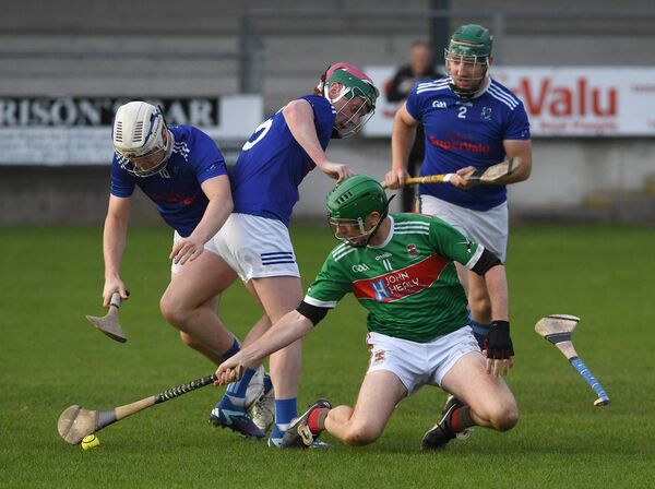 Flying hurley: Tooreen’s Fiachra Glavey, Eddie Groarke and James Freyne battle for possession with Ballina Stephenites Padraig O’Flynn.