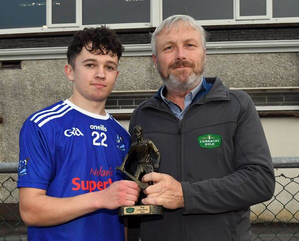 John Holmes, Connacht Gold, sponsors, presents Tooreen’s, Sean Lynskey, with the man-of-the-match award after the Connacht Gold Mayo Junior A Hurling final at James Stephens Park last Friday evening. Picture: David Farrell Photography 